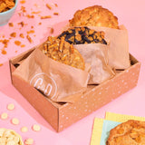 3 x New York Cookies, The Extra Crunchy Box featuring Cereal Milk, Pretzel White Chocolate, and Caramel Cornflake cookies in a gift box